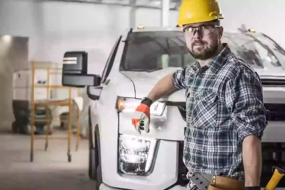 contractor with his tools and auto