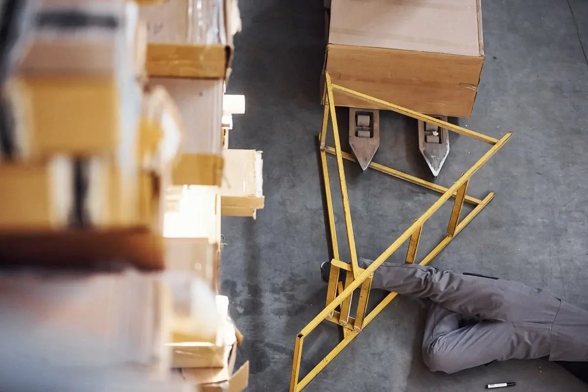 man fell accidentally on the ladder in workplace