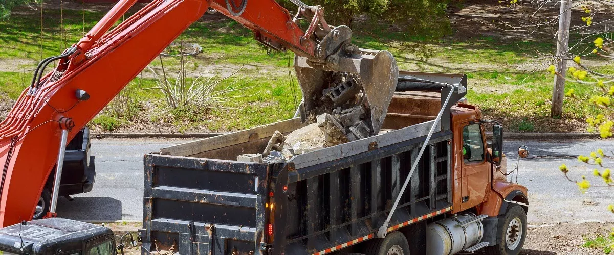 Truck removing debris
